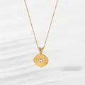 Close-up of golden necklace with square radiant pendant and central zircon stone - Square Style (N0377G) / Square Gold