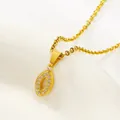Macro view of a gold titanium necklace featuring a marquise-shaped pendant with zircons - Marquise Style (N0048)