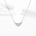 Detailed view of silver titanium steel heart wing pendant with shimmering white zircons - Steel White Zirconia Style (N0249S)