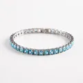 Detail of square light blue zirconia tennis bracelet with silver metal clasp - Aqua