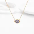 Golden Evil Eye necklace with blue and white cubic zirconia on a minimalist chain - Eye Shape Gold