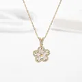 Elegant gold flower necklace featuring sparkling crystals and a refined five-petal design - Gold Color White Stone