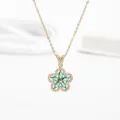 Golden flower necklace with five green petal-shaped stones and shimmering crystals - Gold Green Stone