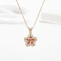 Golden flower pendant necklace with five red petal gems and pavé zircon accents - Gold Red Stone