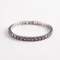 Elegant silver tennis bracelet featuring square-cut purple zircons in a classic row - Purple