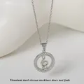 Zilveren titanium stalen ketting met een met zirkoon bezette g-sleutel hanger - Zilver Muzieknoot (N0422S)