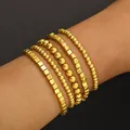 Set de 5 pulseras minimalistas de cuentas doradas elásticas para un estilo apilado - Estilo apilable mixto de cuadrados y cuentas / Set de 5 piezas / Dorado