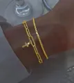 Set di bracciali dorati a due strati con ciondolo a croce e zirconi scintillanti - Set Catena Doppia Pendente Croce Oro (5862002)