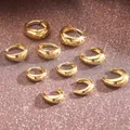 Goldenes Set aus minimalistischen Creolen und Ohrmanschetten mit poliertem Design - Glatte Creolen-Kombination (5971901) / Gold