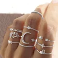 Bohemian silver knuckle ring set featuring moon star and heart designs on hand - Silver Moon Star Heart Set (5533925) / Silver