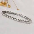 Macro detail of silver tennis bracelet featuring round cubic zirconia in bezel setting - Round Inlaid Beaded Style (B0185S) / 18cm / Steel / White Zircon