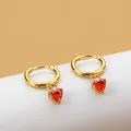 Golden heart hoop earrings featuring vibrant red heart-shaped gemstone pendants - Gold Color Red Zirconia