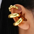 Three-piece golden C-shape ear cuff set with beaded and polished metallic textures - Gold Beaded And Smooth Surface Ear Cuffs (6347701HB)