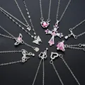 Nine-piece silver necklace set featuring butterfly heart planet and cross pendants with crystals - Butterfly Cross Heart Planet Necklace(6417601HB)