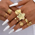 Set di 8 anelli dorati a tema marino con motivi di stelle marine conchiglie e fiori - Stile oceano stella marina conchiglia fiore (6487701HB) / Oro