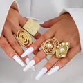 Four-piece gold fashion ring set with flower patterns and imitation pearls - 4-Piece Gold Hammered Pearl Ring Set (6414801HB)