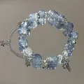 Elastic beaded bracelet with icy crackle blue beads and silver star pendants - Blue Ice Crack Cross Style (S431)