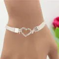 Pulsera de capas plateada con dije de corazón con pedrería y malla metálica - Pulsera Corazón Hueco Strass Malla Plata (5876801)