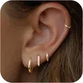 4-piece set of gold cuff earrings with cubic zirconia shown on a model's ear - 6395901HB/Gold Zirconia Hoop 4-Piece Set