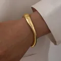 Polished gold irregular liquid metal wide cuff bracelet with asymmetric design - Wave Streamlined Style (6157736943906)