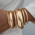 Polished gold multi-layer wide bangle set for women with glossy finish and stackable design - Gold Wide and Thin Mix Style (6546601HB)