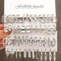 24 pairs of silver-tone hoop and faux pearl earrings set on white display card - Large Capacity Multi-style Silver Set (5670902HB)