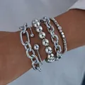 Close-up of stacked silver punk style bracelets with paperclip and bead chains on wrist - Chunky Chain Round Beads 5-Piece Set / Silver