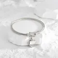 Bracciale a cavo ritorto in acciaio inossidabile con ciondolo a cuore e chiusura a U - Colore acciaio