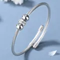 Bracciale rigido a torchon argento con sfere lucide e anello di cristalli scintillanti - Colore acciaio