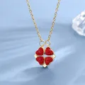 Collana a quadrifoglio convertibile in oro con cristalli a cuore rossi su sfondo blu a onde - Quadrifoglio Rosso