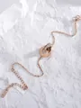 Bracciale a doppio anello in oro rosa con numeri romani e cristalli su pietra bianca - Bracciale / Oro rosa