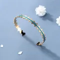 Bracciale rigido dorato aperto a C con smalto blu e design con bordo seghettato - Celeste