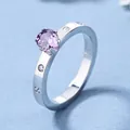 Bague élégante en or rose avec une pierre violette et des accents de diamants étincelants - Lavande