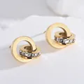 Boucles d'oreilles dorées avec chiffres romains et pierres en zircon cubique - Boucles d'oreilles / Or