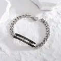 Dettaglio del braccialetto di coppia con incisione 'I Love You Most' e zircone - Stile Inciso Nero Argento / Nero
