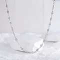 Elegante collana in acciaio al titanio argento con maglie a lisca e piccoli cuori - Collana