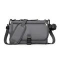 Portable gray diaper changing bag with adjustable shoulder strap and storage pocket - Dark Gray