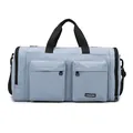 Blue travel duffel bag with multiple pockets, independent shoe compartment, and shoulder strap - Blue