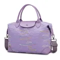 Large purple travel bag with colorful embroidery and leather trim handles - Light Purple