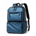 Deep blue water-resistant travel backpack with multi-layer zipper compartments and ring pulls - Blue