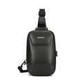 Hardshell sling bag with anti-theft lock, USB port and carbon fiber texture in black - Black