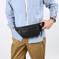 Men's black leather waist bag with lychee texture and adjustable shoulder strap - Black