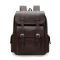 Vintage dark brown leather backpack with multiple pockets and metal buckle closures - Brown