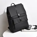 Minimalist black waterproof backpack with flap closure and metal buckle for commuters - Black