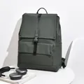 Minimalist dark green commuter backpack with matte black strap and metal buckle closure - Green
