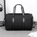 Large capacity black travel bag with water-resistant fabric and striped straps for fitness - Black