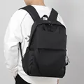 Large black minimalist business laptop backpack shown in professional studio setting - Black