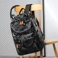 Men's stylish camouflage backpack with USB charging port and orange zippers - Black
