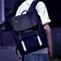 All-black waterproof backpack for men featuring safety reflective strips and large capacity - Black