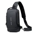 Close-up of black crossbody bag featuring external USB port and breathable mesh strap - Black